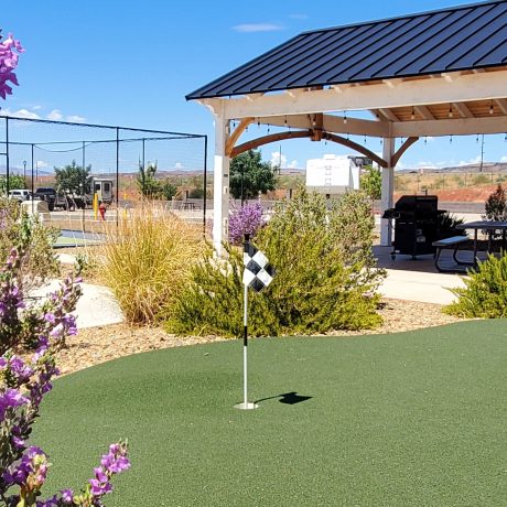 A modern clubhouse with comfortable seating and recreational areas at Southern Utah RV Resort near St. George, Utah.