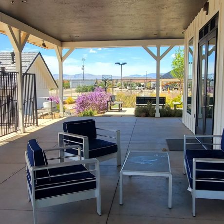 A modern clubhouse with comfortable seating and recreational areas at Southern Utah RV Resort near St. George, Utah.